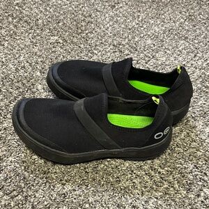 Oofos Black Slip-On Shoes with Green Accents